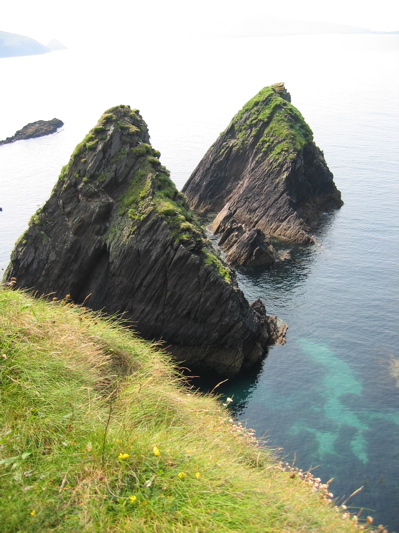 Me, in Ireland, next to a very large cliff.